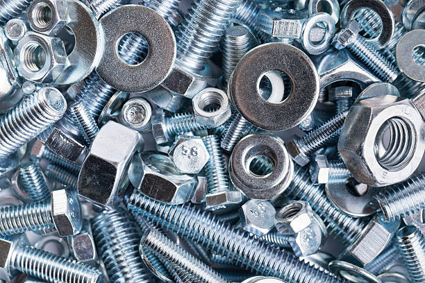pile of steel nuts and bolts
